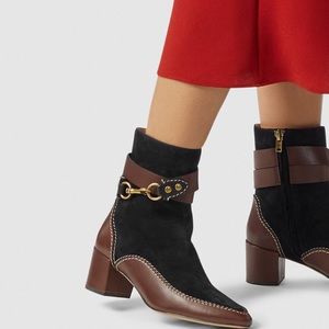 Coach women’s black and brown suede and leather Corinne booties